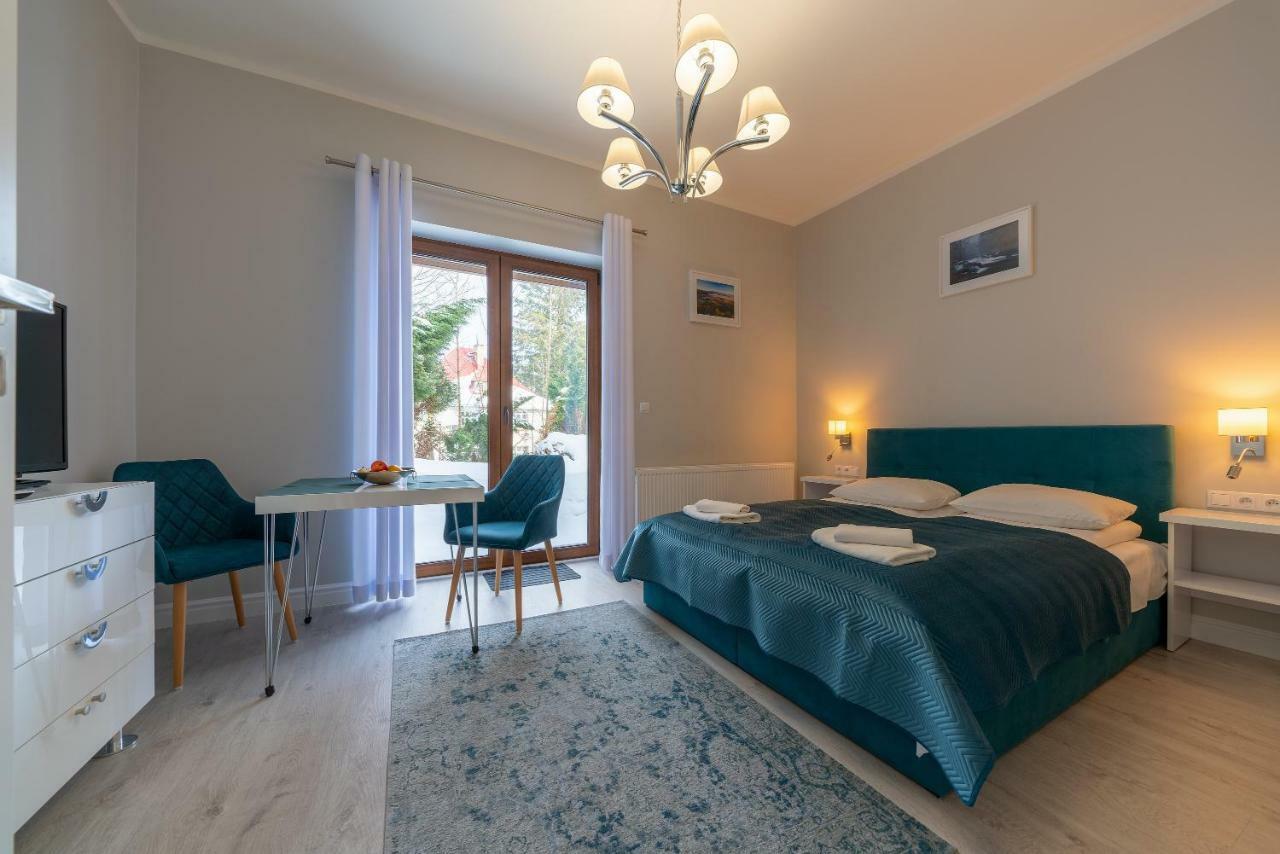 Bialy Zakatek Apartment ชกลาร์สกา ปอเรมบา ภายนอก รูปภาพ