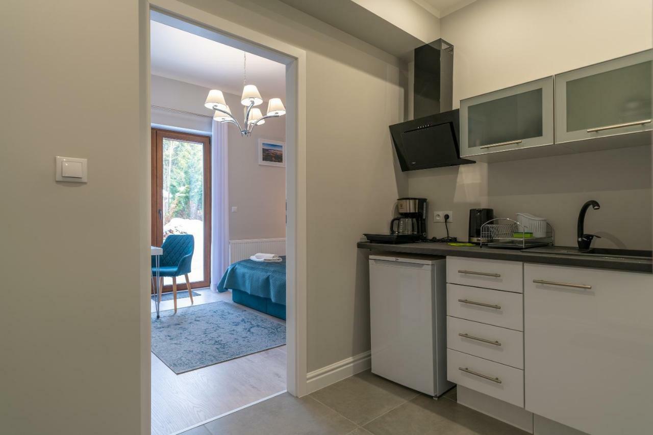 Bialy Zakatek Apartment ชกลาร์สกา ปอเรมบา ภายนอก รูปภาพ